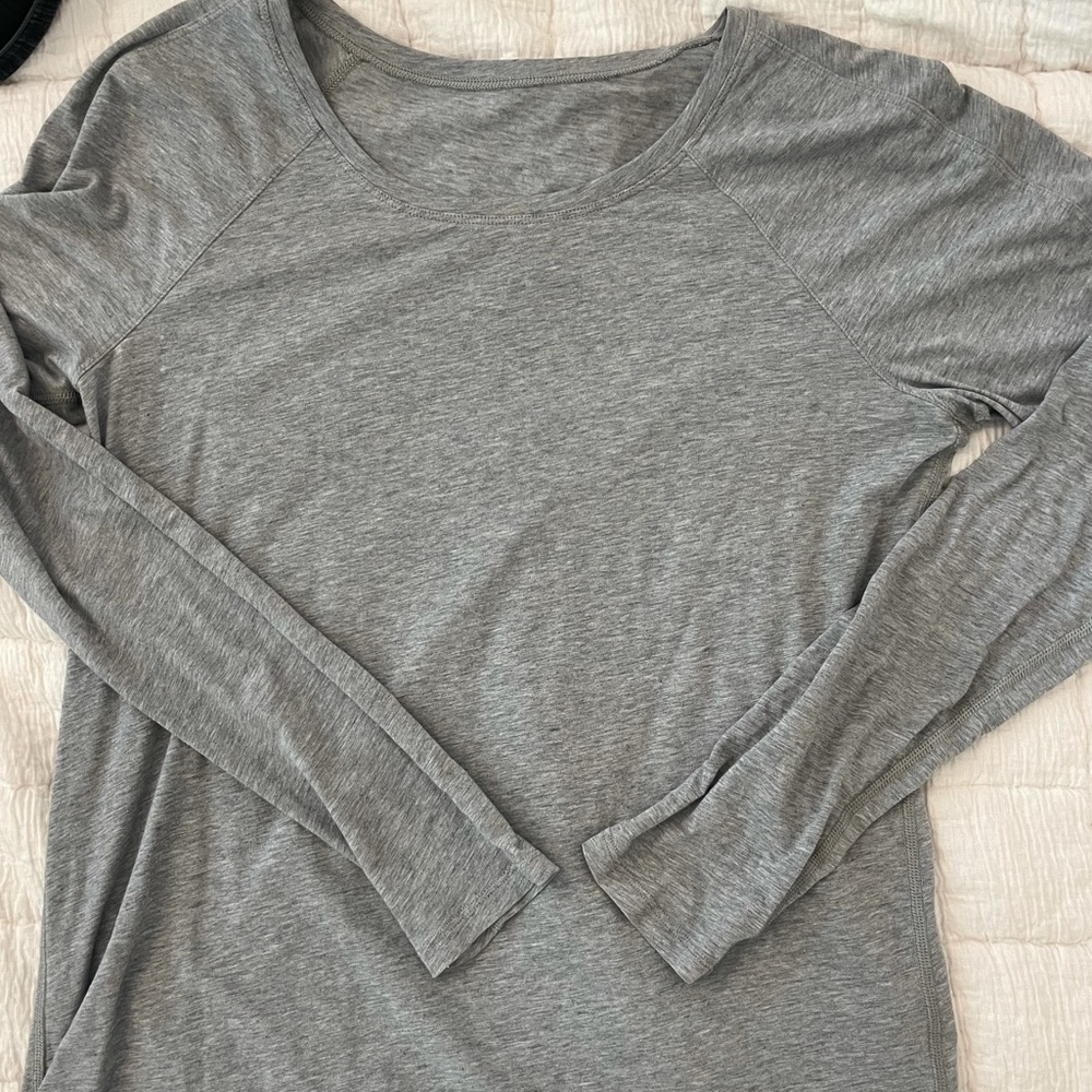 Lulu lemon long sleeve grey athletic top.
